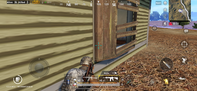 creeping by a beige building in PUBG Mobile