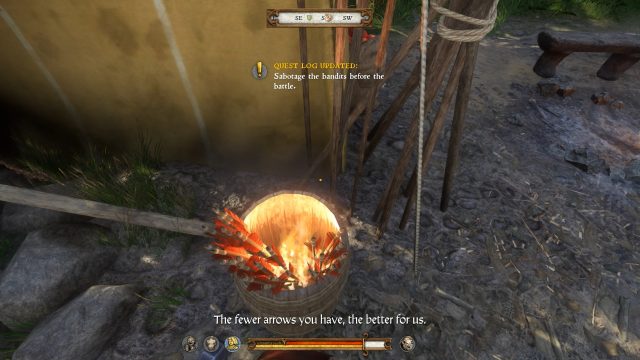 The player sabotages a bucket of arrows with fire inside the bandit camp