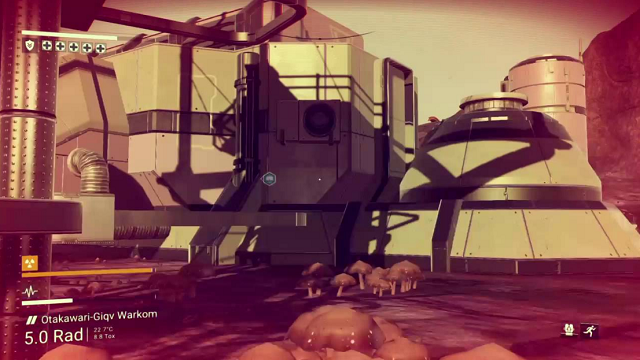 The side of a manufacturing facility in No Man's Sky