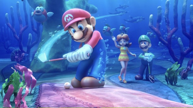 Mario teeing off on an underwater course, with Princess Daisy and Luigi standing behind him. 