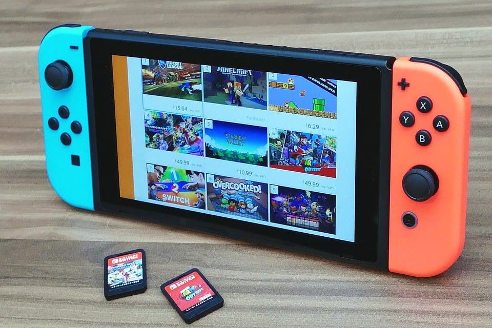 Nintendo Switch with neon red and blue Joy Cons
