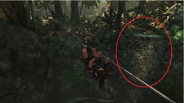 Lara Croft climbs a rope tether across a chasm in the jungle