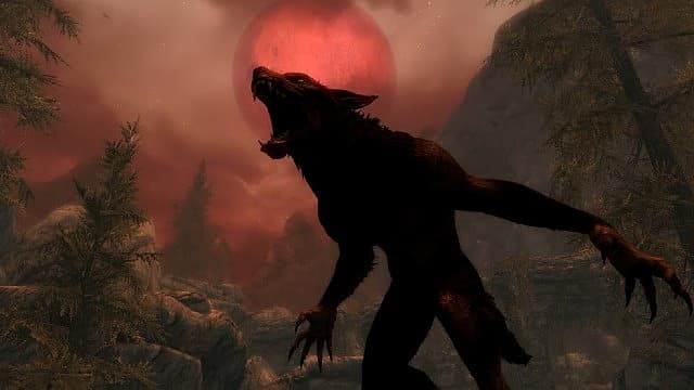 Werewolf howling in front of a red moon.