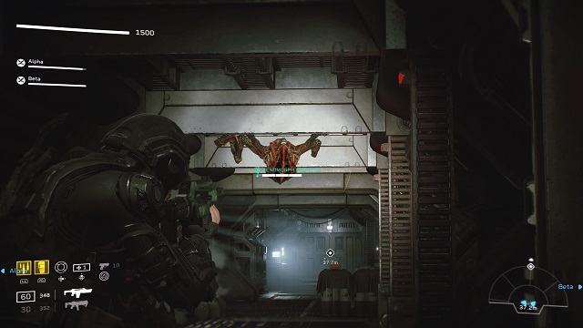 A Colonial Marine aiming a pulse rifle at a red Prowler alien on the ceiling in a dark corridor.
