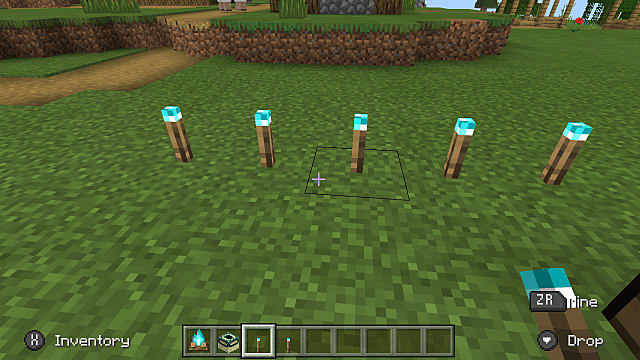 A set of blue flame soul torches in Minecraft.