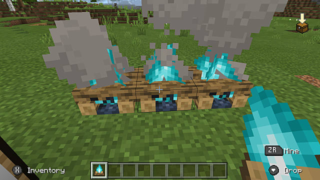 Three soul campfires next to each other with blue flame.