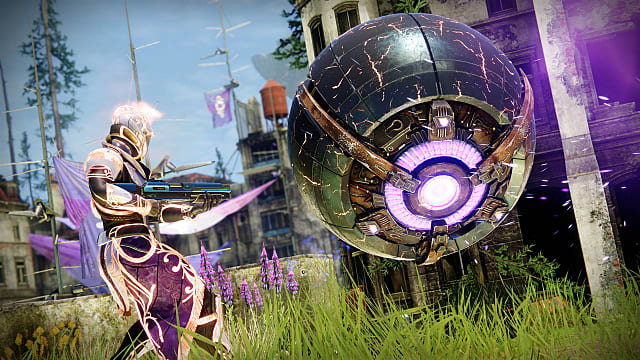 A Titan in gold and purple armor aims a fusion rifle at a Servitor in the EAZ.