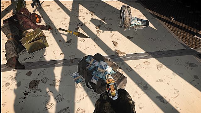 A bag of cash sits next to a downed player in Warzone's Plunder.